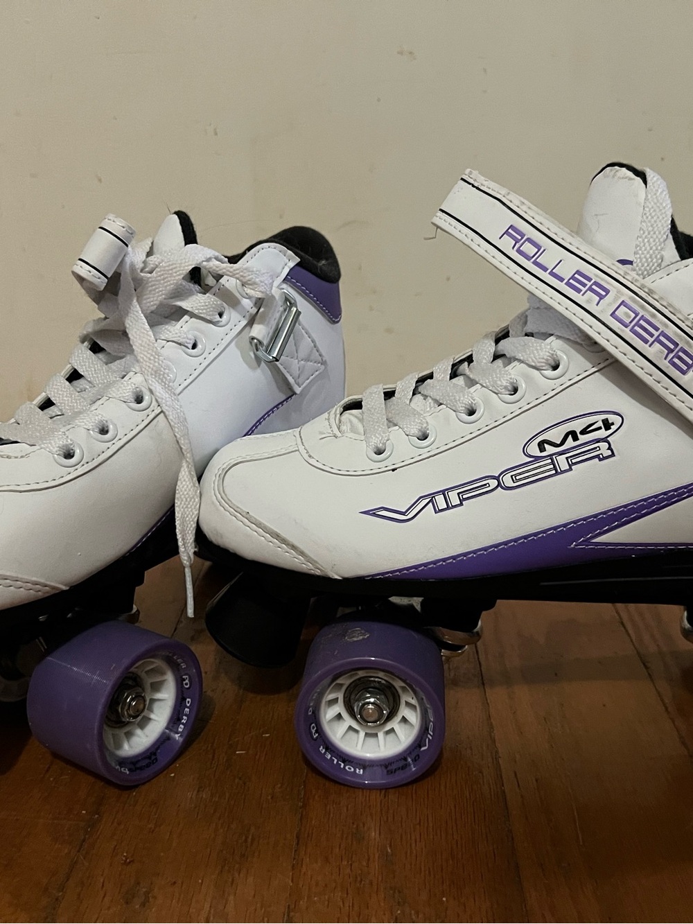 Women’s White and Purple Roller Skates